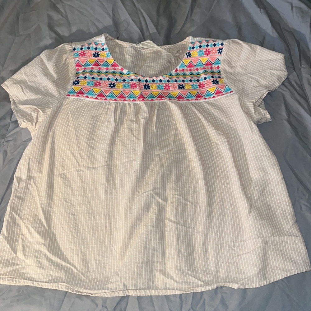 Savanna Jane peasant blouse. Embroidered around neckline. Hip length. Size large